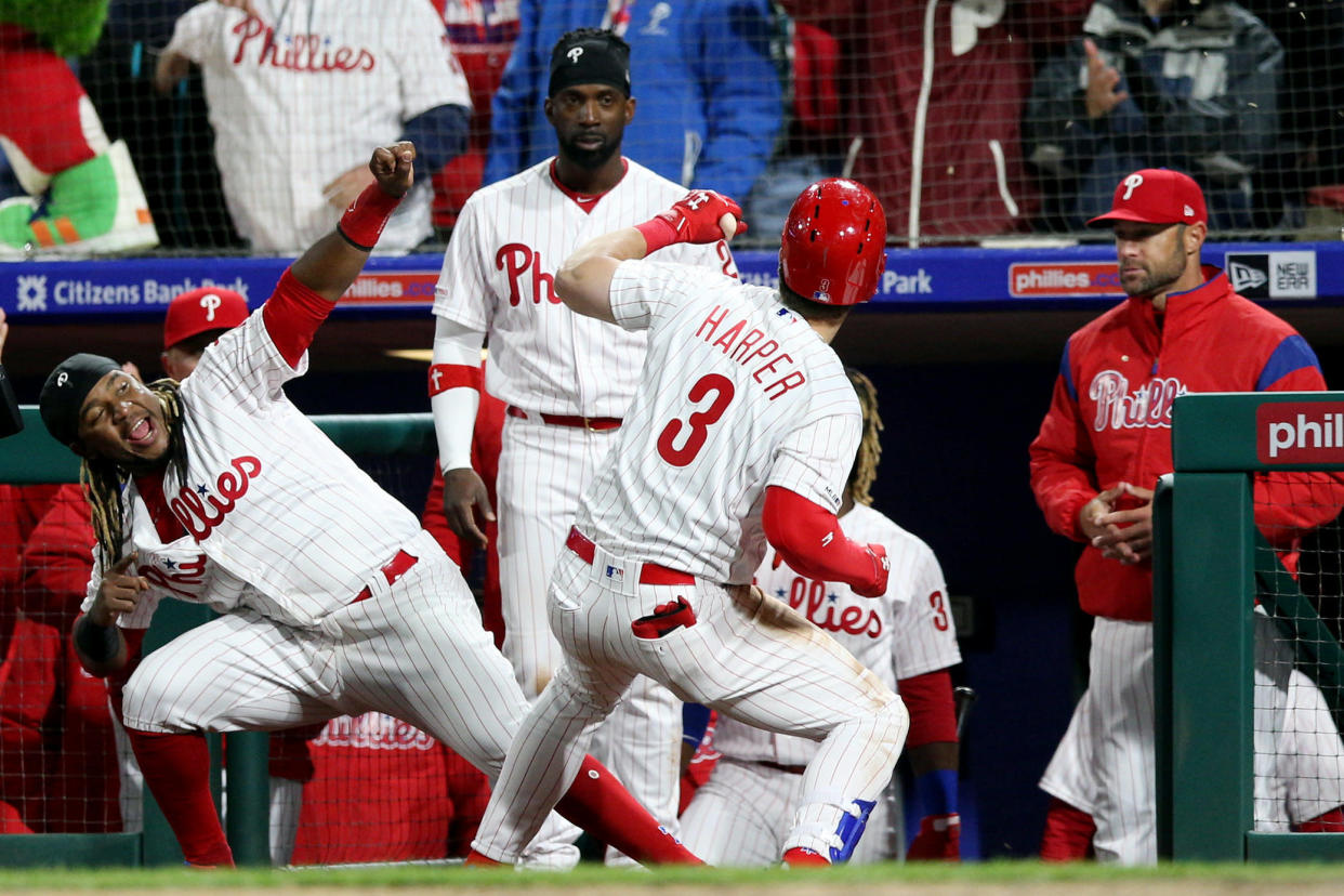 PHILADELPHIA, PA - MARCH 31:  Bryce Harper #3 of the Philadelphia Phillies is greeted by teammate Maikel Franco #7 after hitting a home run in the seventh inning during the game between the Atlanta Braves and the Philadelphia Phillies at Citizens Bank Park on Sunday, March 31, 2019 in Philadelphia, Pennsylvania. (Photo by Rob Tringali/MLB Photos via Getty Images)