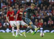 <p>Celta Vigo’s Daniel Wass in action with Manchester United’s Ander Herrera </p>