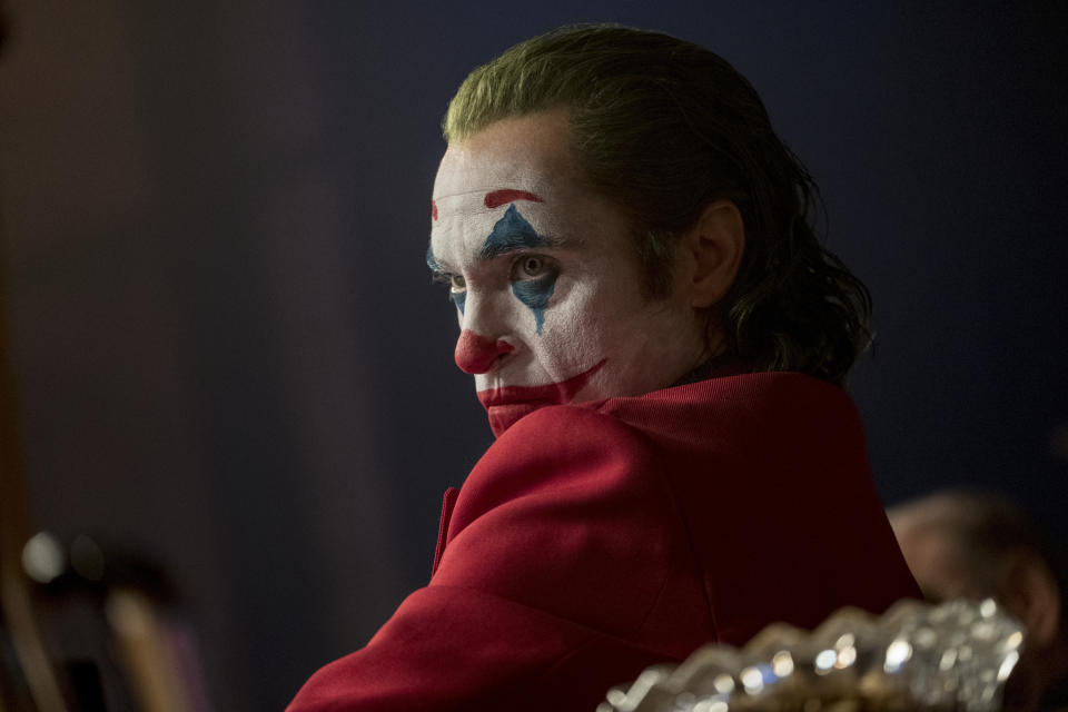 This image released by Warner Bros. Pictures shows Joaquin Phoenix in a scene from "Joker." (Niko Tavernise/Warner Bros. Pictures via AP)