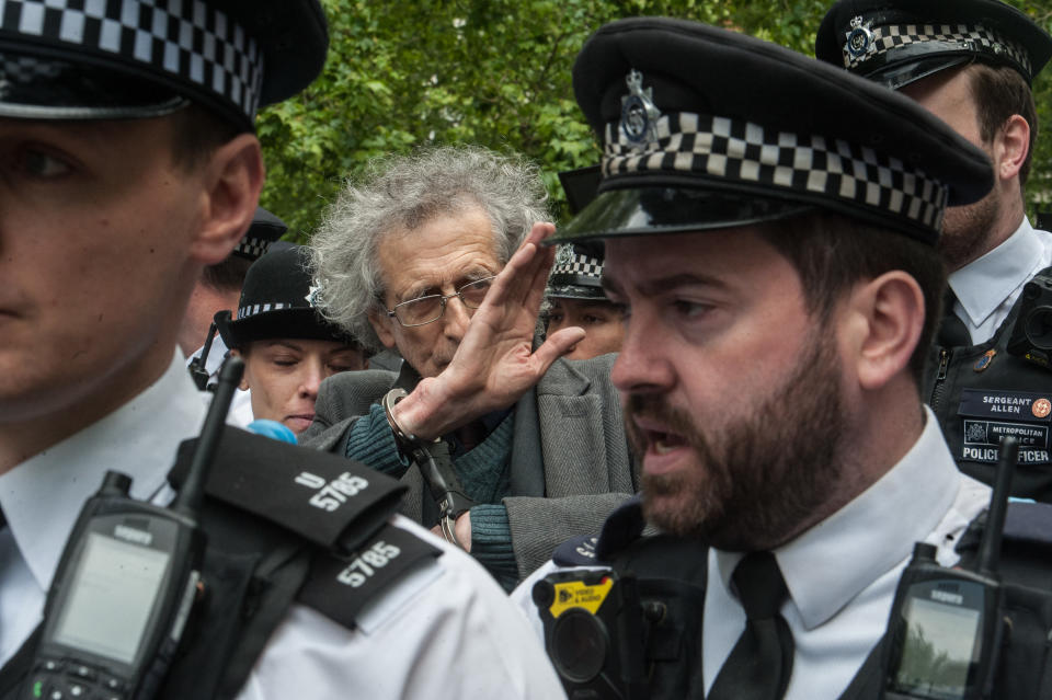 LONDON, ENGLAND - MAY 16: Piers Corbyn (brother of former Labour leader Jeremy Corbyn) is arrested as conspiracy theorists gather at Hyde Park Corner to defy the emergency legislation and protest their claim that the Coronavirus pandemic is part of a secret conspiracy on May 16, 2020 in London, United Kingdom. The prime minister has announced the general contours of a phased exit from the current lockdown, adopted nearly two months ago in an effort curb the spread of Covid-19. (Photo by Guy Smallman/Getty images)