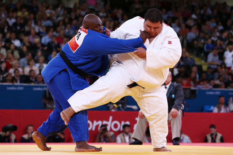 LONDON, ENGLAND - AUGUST 03: Ricardo Blas Jr of the United States competes with Facinet Keita of Guinea in the Men's 100 kg Judo on Day 7 of the London 2012 Olympic Games at ExCeL on August 3, 2012 in London, England. (Photo by Quinn Rooney/Getty Images)