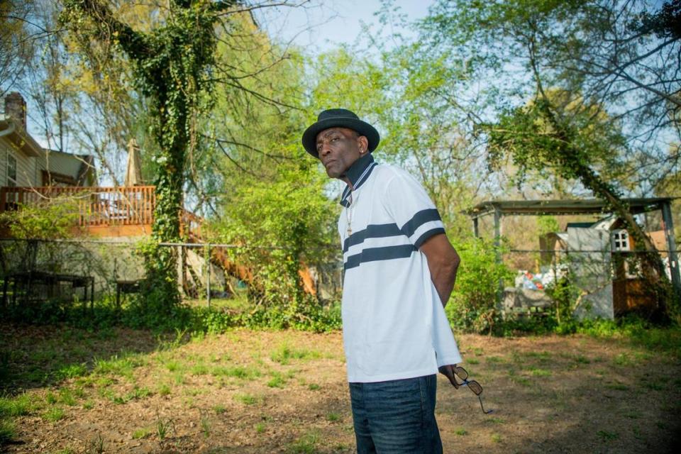 Ronnie Long stands for a portrait in his backyard, on Wednesday, Apr. 7, 2021, in Durham, N.C.