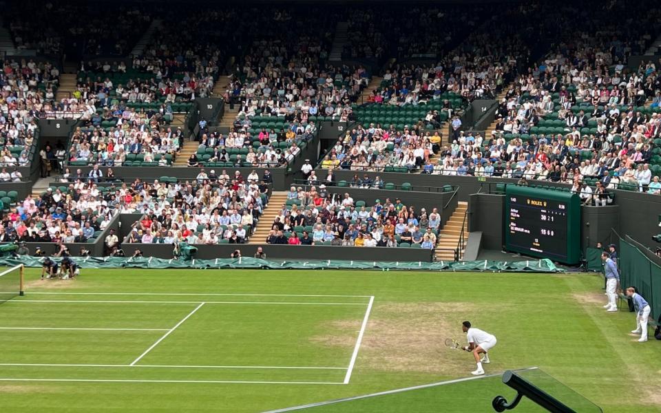 Rows of empty seats can be seen during Monday's match on Court No 1 between Alex de Minaur and Arthur Fils