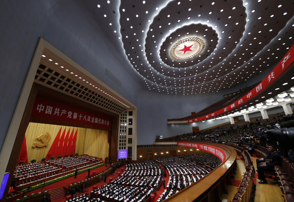Delegates attend the closing ceremony for the 18th Communist Party Congress at the Great Hall of the People in Beijing Wednesday Nov. 14, 2012. (AP Photo/Vinecnt Yu)