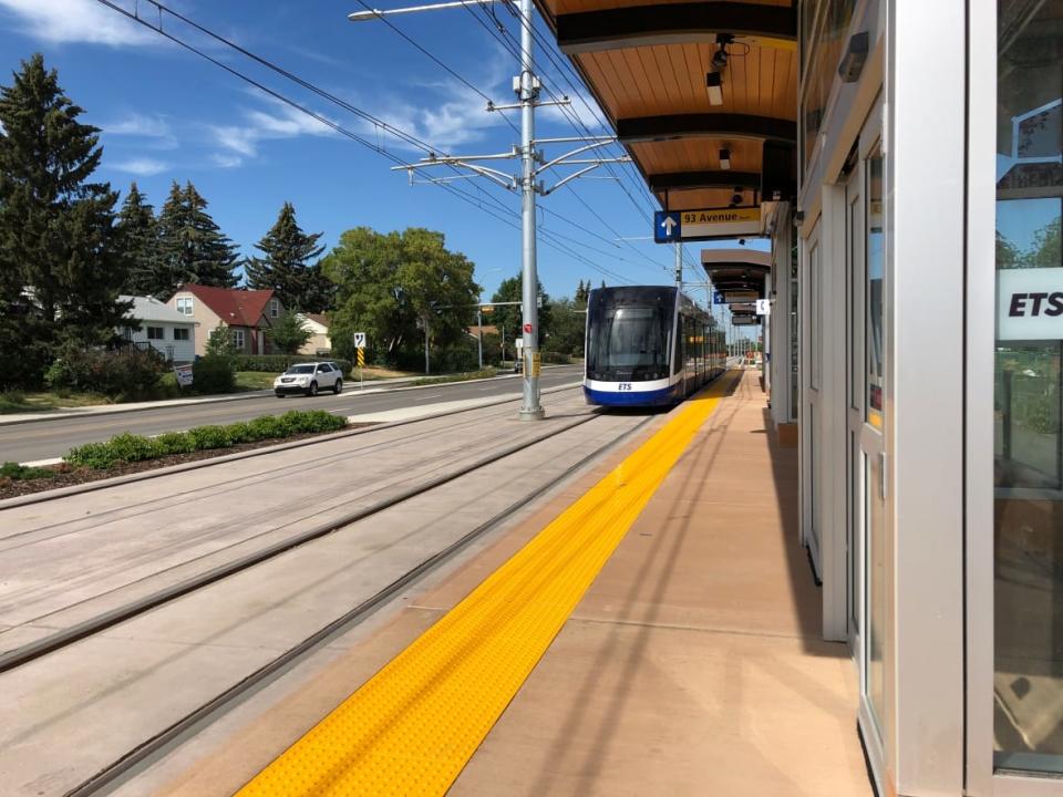 Trains sit idle on part of the Valley Line Southeast LRT route. The line is almost two years overdue from its original opening date of late 2020.   (Laurent Poirot/CBC - image credit)