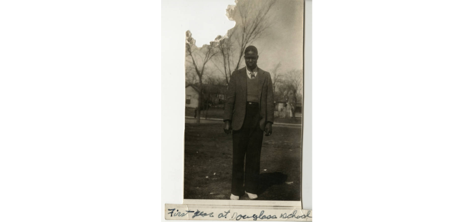 This photograph of an unidentified young man is labeled "First year at Douglass School." It comes from the Harris Family Photographs Collection, a collection of photographs of family, friends, employers, churches, and schools collected by Julia Warren Harris.