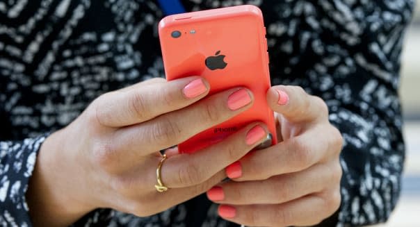 Apple's New IPhone Poised for Record Debut as Sales Begin