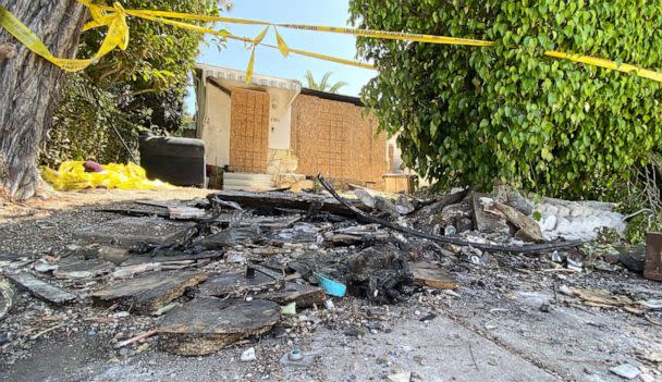 PHOTO: Charred debris and caution tape are seen at the site where actress Anne Heche crashed into a home in Mar Vista, Calif., Aug. 8, 2022.  (Chris Delmas/AFP via Getty Images)