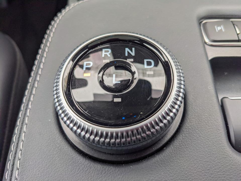 <p>This is actually pretty slick. Just spin the bezel to switch gears and tap the L to toggle one-pedal driving. However, it does get sketchy when backing out of my driveway and into busy street traffic because I have to look down at the shifter to ensure I'm actually in Drive and not Neutral.</p> 