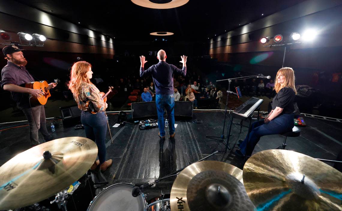 Hayes Permar, center, greets the audience before The One Eighties perform at the Rialto Theater in Raleigh, N.C. on Friday, Nov. 3, 2023. Ethan Hyman/ehyman@newsobserver.com