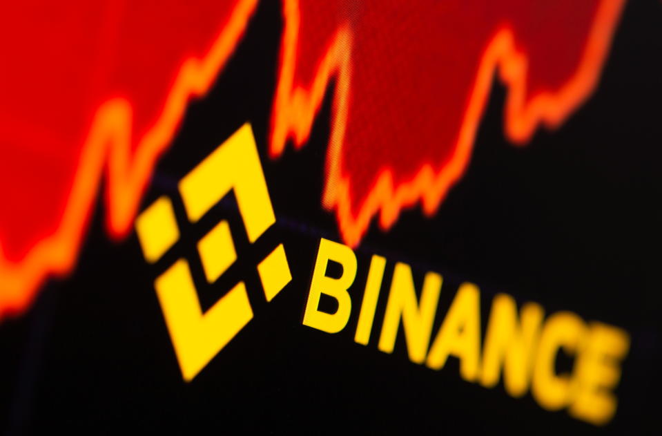 Binance logo and stock graph are displayed in this illustration taken, June 28, 2021. REUTERS/Dado Ruvic/Illustration