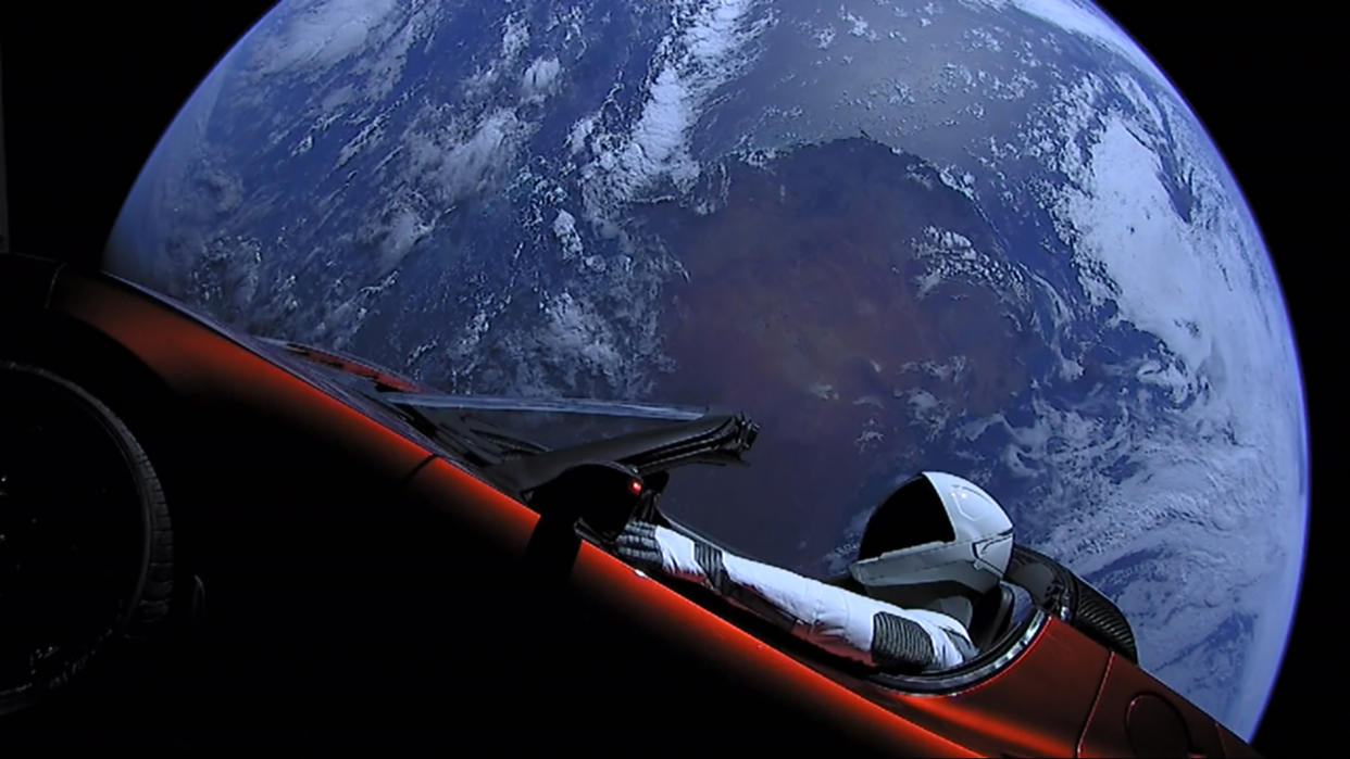 IN SPACE - FEBRUARY 8: In this handout photo provided by SpaceX, a Tesla roadster launched from the Falcon Heavy rocket with a dummy driver named "Starman"  heads towards Mars. (Photo by SpaceX via Getty Images)