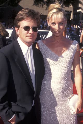 <p>Ron Galella, Ltd./Ron Galella Collection via Getty</p> Michael J. Fox and Tracy Pollan in 1996