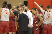 Nebraska head coach Fred Hoiberg huddles with his players between drills at the team's Pro Day workout Tuesday, Oct. 5, 2021, at the Hendricks Training Complex in Lincoln, Neb. (AP Photo/Rebecca S. Gratz)