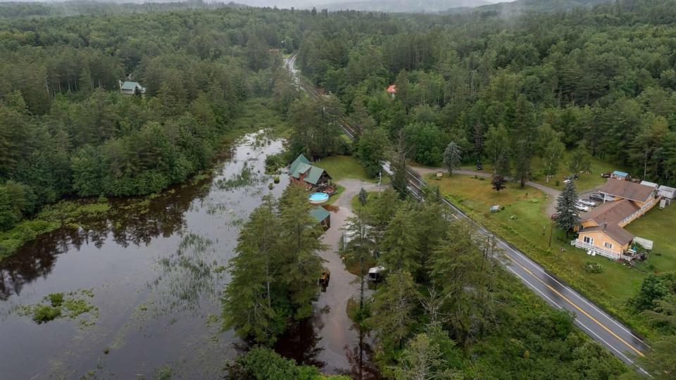 PHOTO: An aerial view shows floodwater covering residential property on Route 11 after heavy rainfall in Londonderry, Vermont, on July 10, 2023. (Scott Eisen/Getty Images)