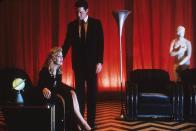 <p><strong>IMDb says:</strong> An idiosyncratic FBI agent investigates the murder of a young woman in the even more idiosyncratic town of Twin Peaks.</p><p><strong>We say:</strong> Shit me. That is one creepy-ass town. </p>