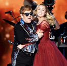 <p>“Sir Elton John, I can’t thank you enough for giving me the honor of performing with you tonight at the Grammys!” the <em>Voice</em> judge captioned this pic of <a rel="nofollow" href="https://www.yahoo.com/entertainment/unlikely-friends-miley-cyrus-elton-john-gush-grammys-performance-211508363.html" data-ylk="slk:her duet with John;elm:context_link;itc:0;sec:content-canvas;outcm:mb_qualified_link;_E:mb_qualified_link;ct:story;" class="link  yahoo-link">her duet with John</a> at the Grammys. “I’ve loved every moment I’ve spent with you over the years & will cherish each second of your kindness …. let’s kick ass and keep fighting for an end to the AIDS epidemic! Everything you do inspires me to keep workin hard and never giving up on all my dreams! Love you dearly!” (Photo: <a rel="nofollow noopener" href="https://www.instagram.com/p/BehLmpbhnmH/?taken-by=mileycyrus" target="_blank" data-ylk="slk:Miley Cyrus via Instagram;elm:context_link;itc:0;sec:content-canvas" class="link ">Miley Cyrus via Instagram</a>) </p>