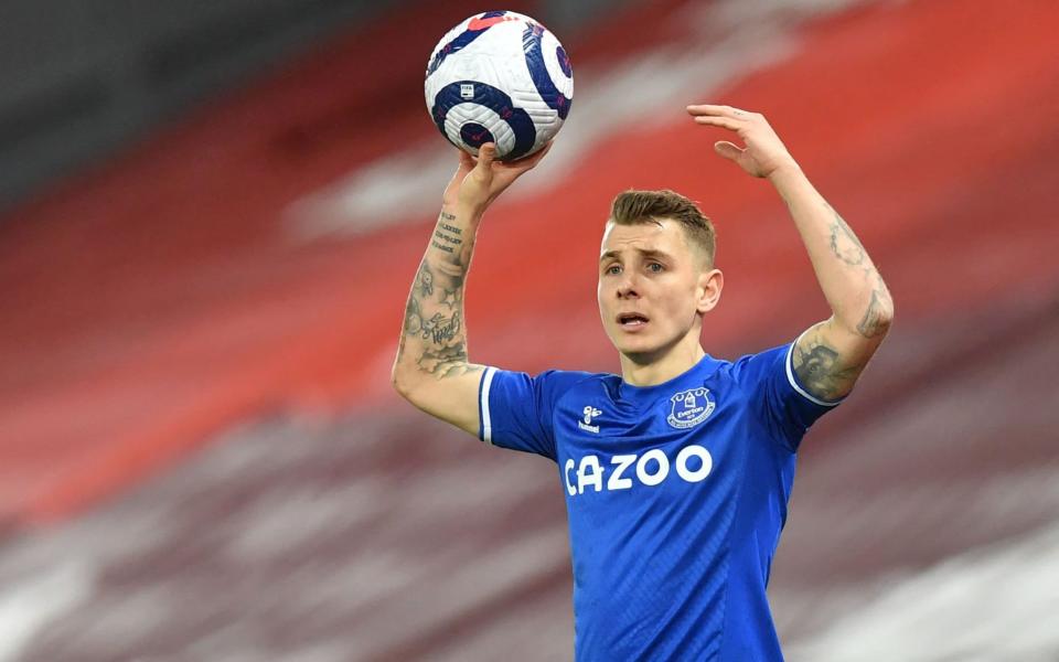 Everton's French defender Lucas Digne prepares to take a throw-in during the English Premier League football match between Liverpool and Everton at Anfield  - AFP