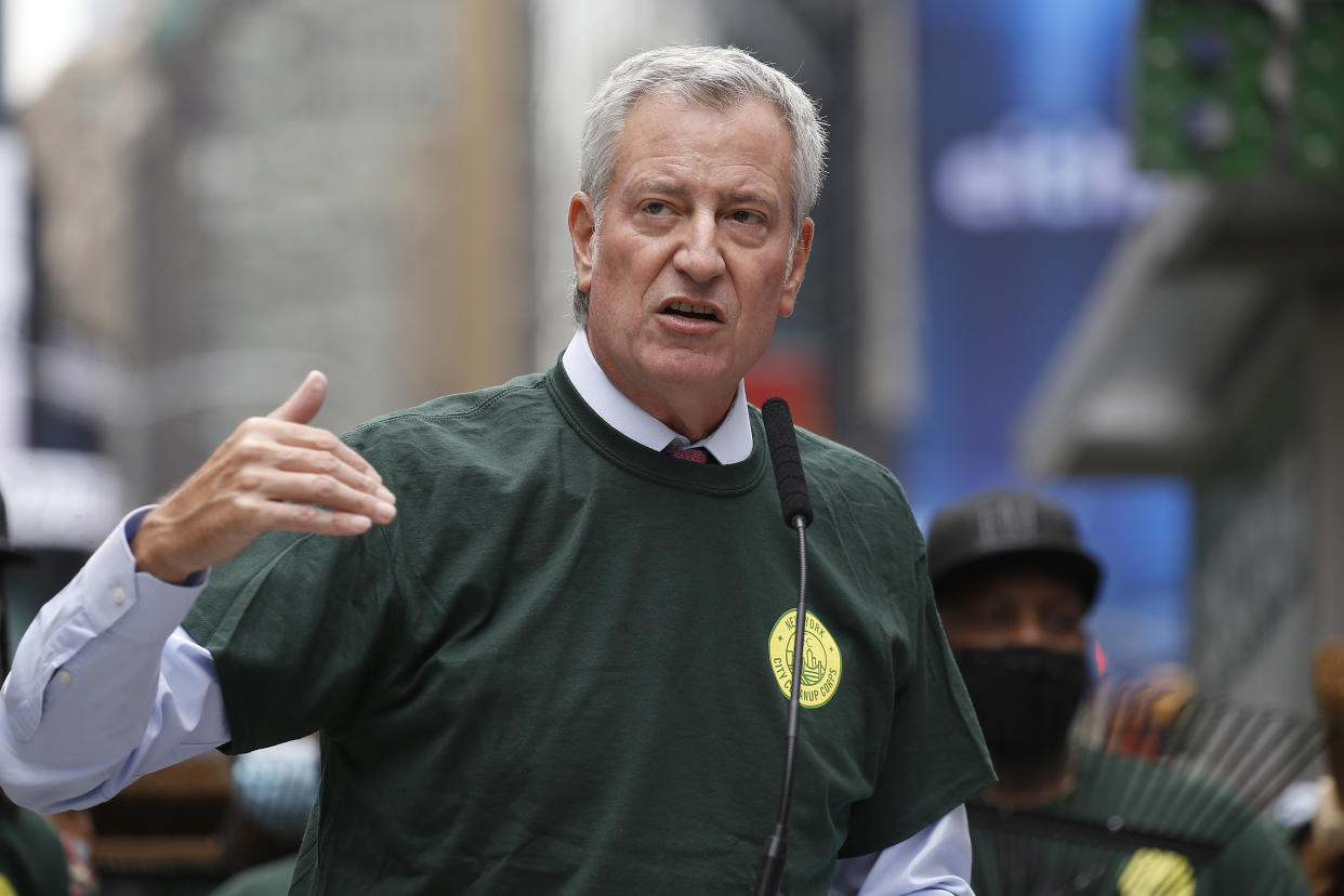 Mayor Bill de Blasio introduces the City Cleanup Corps at Duffy Square on Tuesday in New York City.