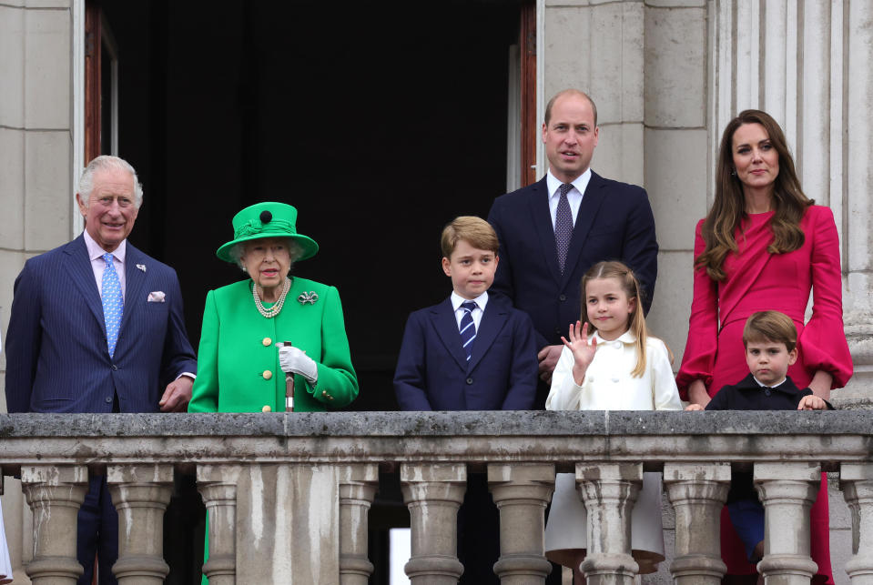 From left, Prince Charles, Queen Elizabeth II, Prince George, Prince William, Princess Charlotte, Prince Louis and Catherine, Duchess of Cambridge, stand on the balcony during the Platinum Pageant on June 5, 2022 in London.  / Credit: Chris Jackson / Getty Images