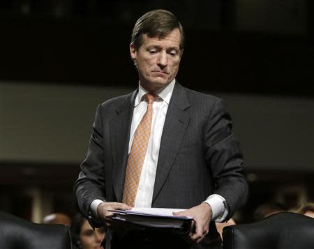 Credit Suisse CEO Brady Dougan awaits to testify before the Senate Homeland and Governmental Affairs Investigations Subcommittee on Capitol Hill in Washington February 26, 2014. REUTERS/Gary Cameron