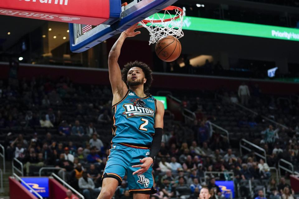 Detroit Pistons guard Cade Cunningham (2) dunks against the Atlanta Hawks in the first half at Little Caesars Arena in Detroit on Friday, Oct. 28, 2022.