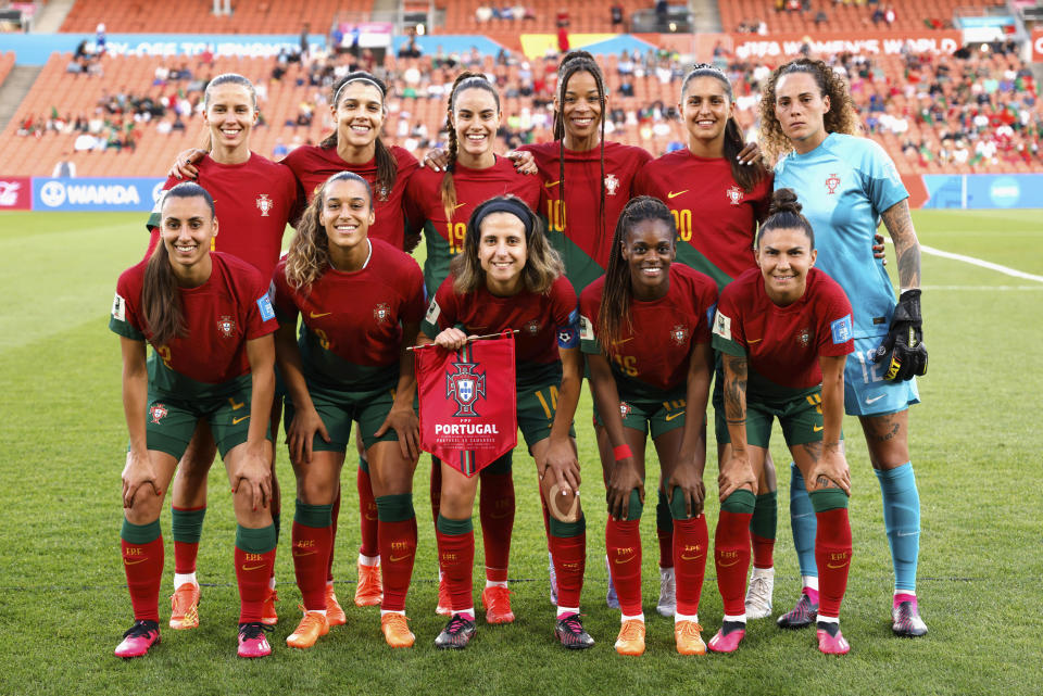 Portugal pose for a team photo ahead of their FIFA women's World Cup qualifier against Cameroon in Hamilton, New Zealand, Wednesday, Feb. 22, 2023. (Martin Hunter/Photosport via AP)