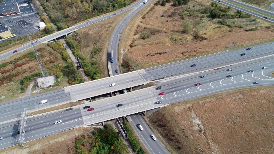 The path of the future Nickel Plate Trail runs beneath bridges of the I-69/I-465 interchange, pictured Wednesday, Oct 14, 2020. When INDOT rebuilds the interchange it will leave space for the future trail.