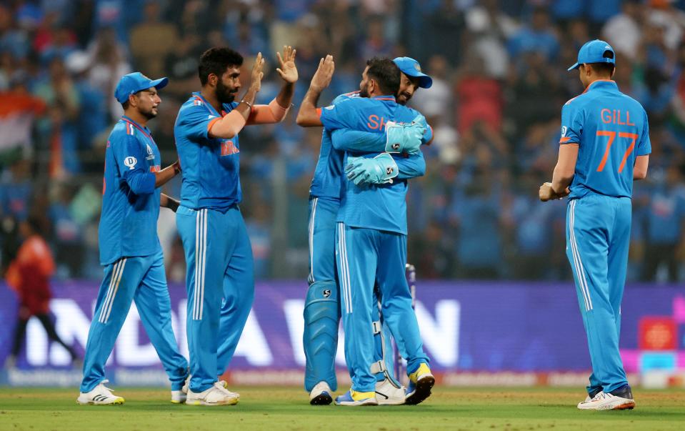 Mohammed Shami of India celebrates with teammates after dismissing Lockie Ferguson of New Zealand (not pictured) to win the ICC Men's Cricket World Cup India 2023 Semi Final match between India and New Zealand at Wankhede Stadium on November 15, 2023 in Mumbai, India.