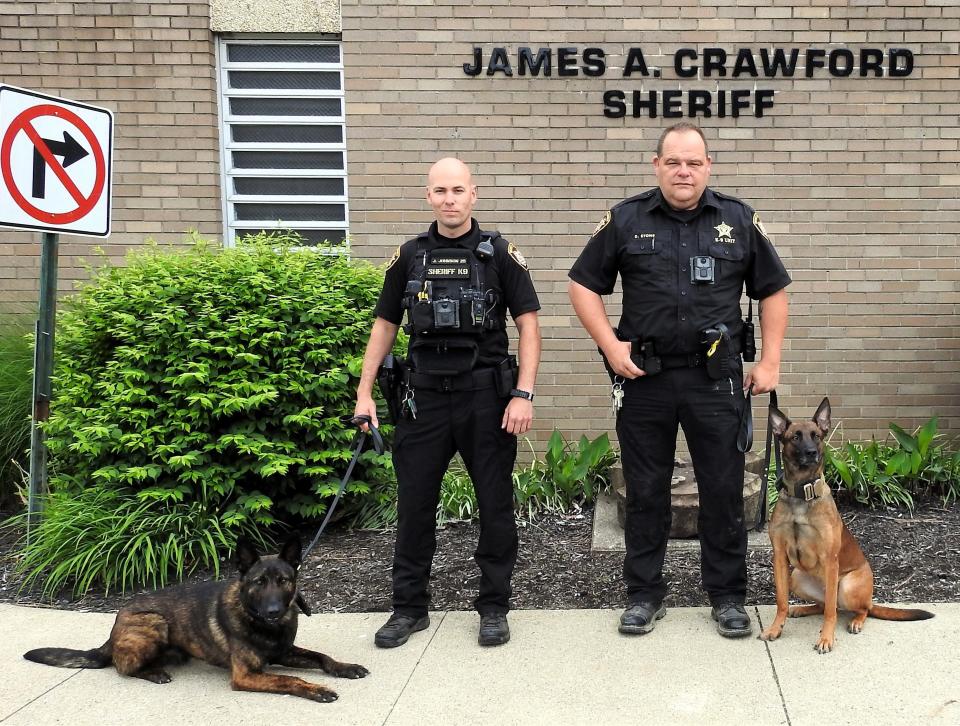 Cpl. Jeremy Johnson with Rip and Det. Sgt. Dave Stone with Charli make up the K-9 division of the Coshocton County Sheriff's Office. Sheriff James Crawford said changes in marijuana laws shouldn't affect the K-9 division much as dogs are used for finding other drugs, article searches, tracking and more.