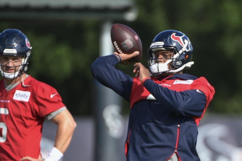 Texans quarterback Deshaun Watson (4) throws the ball during NFL football practice Saturday, July 31, 2021, in Houston. (AP Photo/Justin Rex)