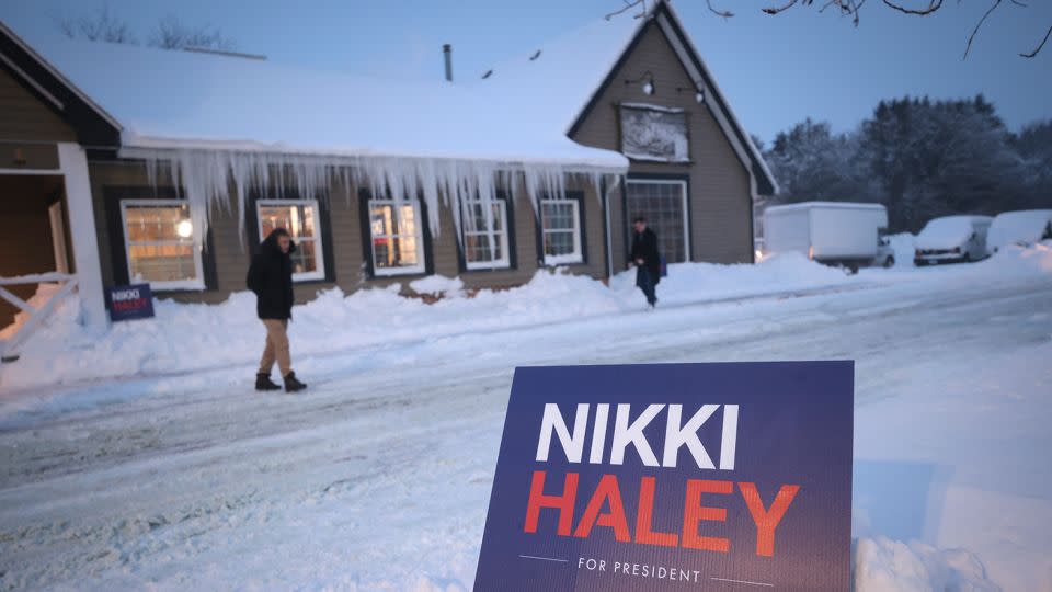 Icicles hang from the roof as people arrive for a Haley campaign event at the Thunder Bay Grille on January 13, 2024, in Davenport, Iowa. - Win McNamee/Getty Images
