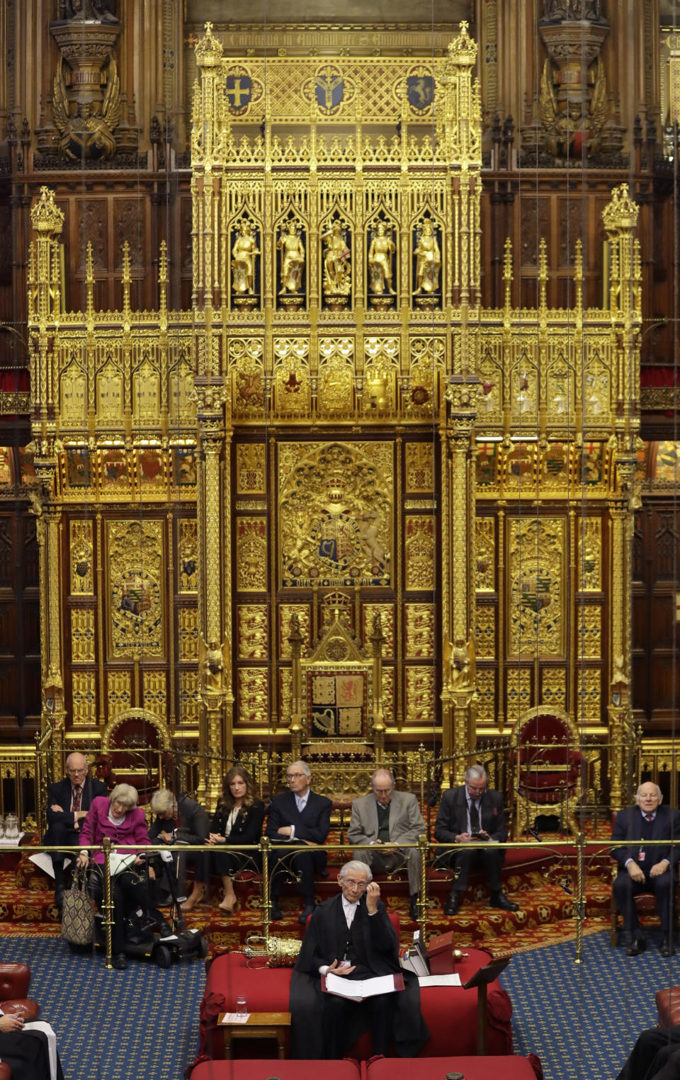 The Lord Speaker Lord Fowler, front centre, listens inside the House of Lords as the European Withdrawal Agreement Bill is debated in London, Tuesday, Jan. 21, 2020. Britain's House of Lords is considering the European Withdrawal Agreement Bill, which is due to pass through its final stages before returning to the House of Commons. (AP Photo/Kirsty Wigglesworth, pool)