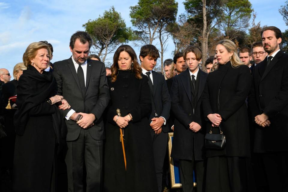 <p>The Greek royals gathered around the graveside. Left to right in the front row: Queen Anne Marie, Prince Nikolaos, Prince Odysseus-Kimon, Princess Theodora, and Prince Philippos.</p>