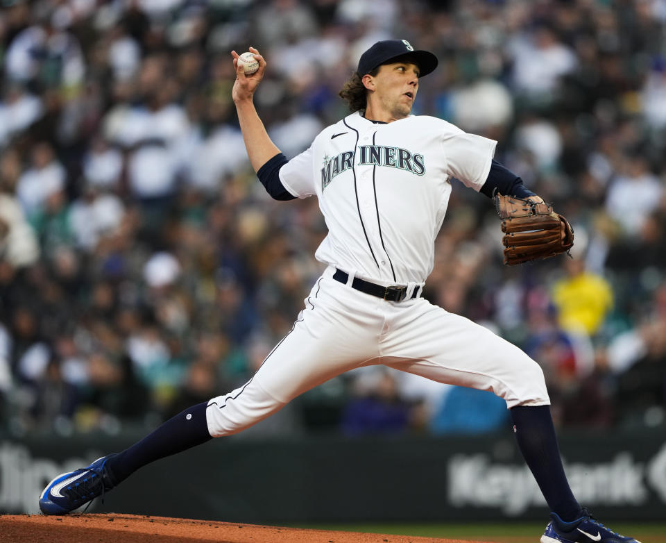 Seattle Mariners starting pitcher Logan Gilbert throws to a Cleveland Guardians batter during the first inning of a baseball game Saturday, April 1, 2023, in Seattle. (AP Photo/Lindsey Wasson)
