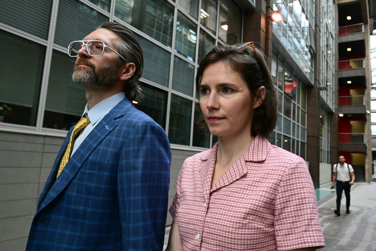 Amanda Knox arrives with her husband Christopher Robinson at the courthouse in Florence (AFP via Getty Images)