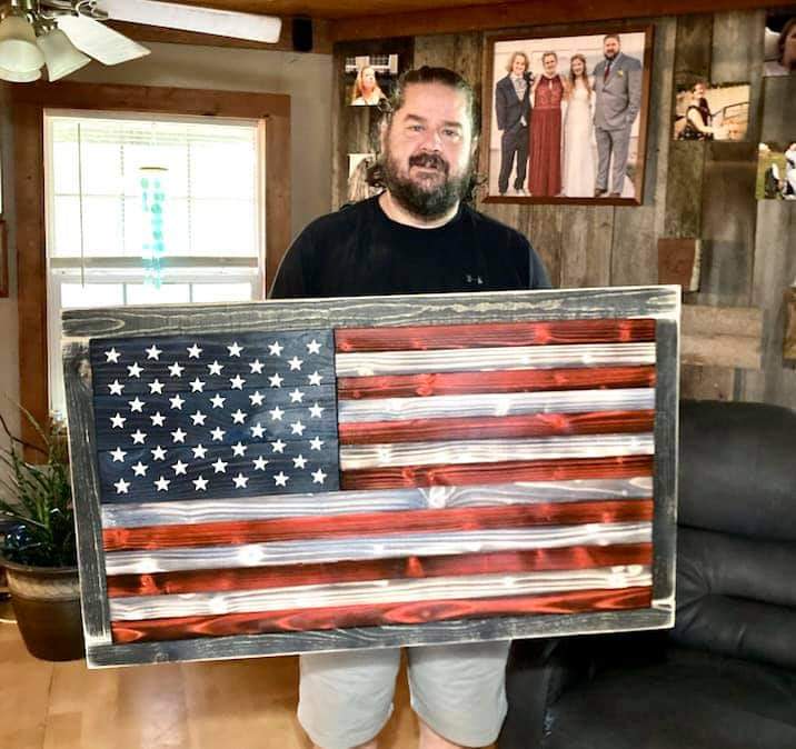 Steve Chapman made this wooden flag that will be auctioned Saturday at the Relive the Night prom for adults 21 and older. The event is a fundraiser for Lawrence County Cancer Patient Services.