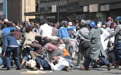 The march was to protest against the cost of living, unemployment, and power and fuel shortages. - Credit: AARON UFUMELI/REX