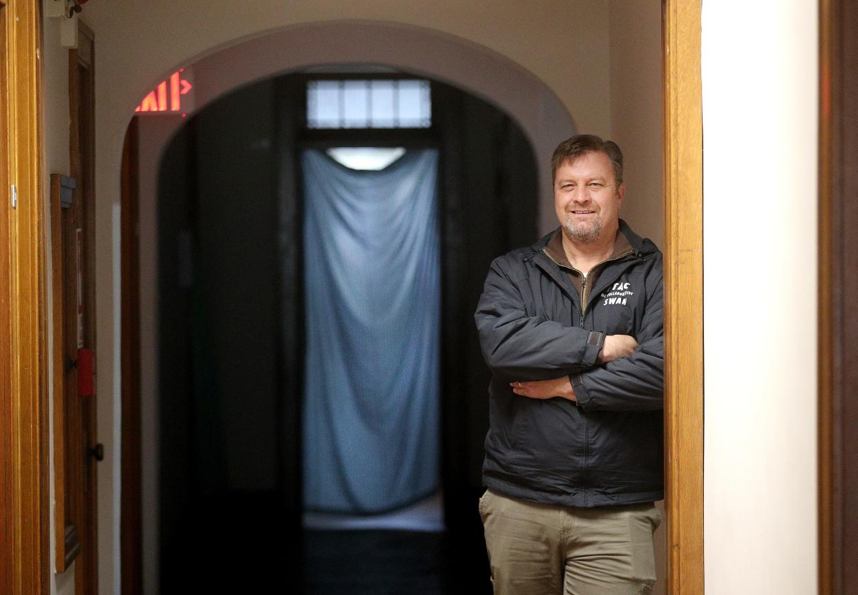  Co-founder  MC Collaborative, Andy Carey is also the Co-Chair  of REACH Advocacy.  He is in an upstairs hallway of the West Main St. shelter that housed some of the homeless through the winter months as part of REACH.  