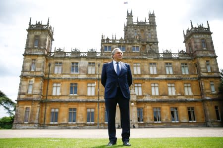 British actor Jim Carter poses during an interview with Reuters at Highclere Castle in Hampshire