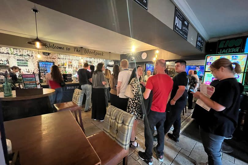 The single file queue at The Woolpack in Norwich