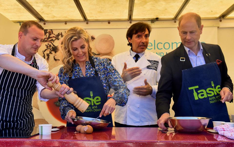 Britain's Prince Edward, Earl of Wessex, and Britain's Sophie, Countess of Wessex, cook an omelette with French chef Jean-Christophe Novelli (POOL/AFP via Getty Images)