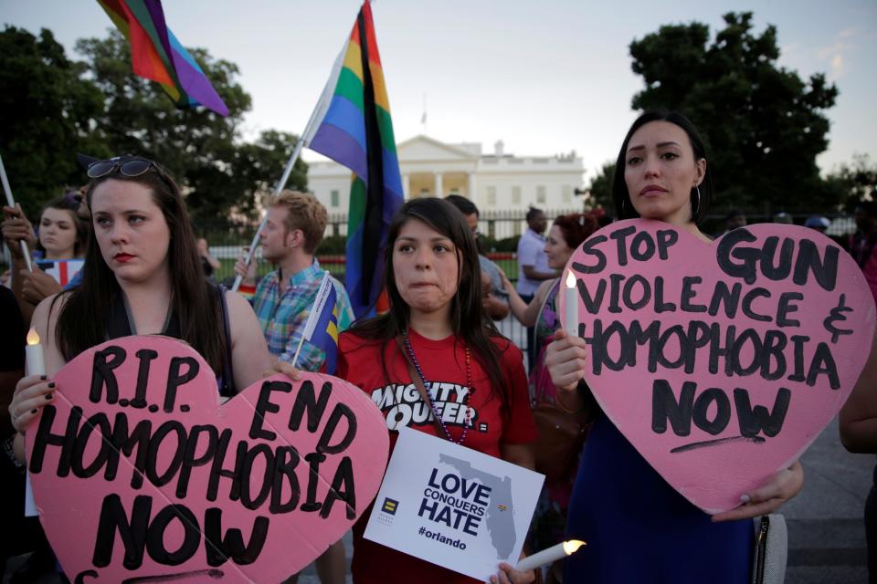 <p>People hold a vigil in front of the White House, June 12, 2016. (Joshua Roberts/Reuters) </p>