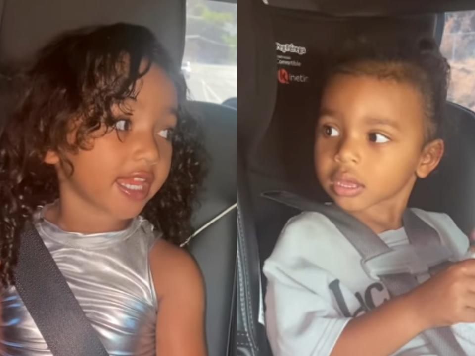 left: chicago west, a young child with curly hair, sitting strapped into a car seat and looking to side; right: her younger brother psalm, also a young child with hair pulled back, looking back towards his sister