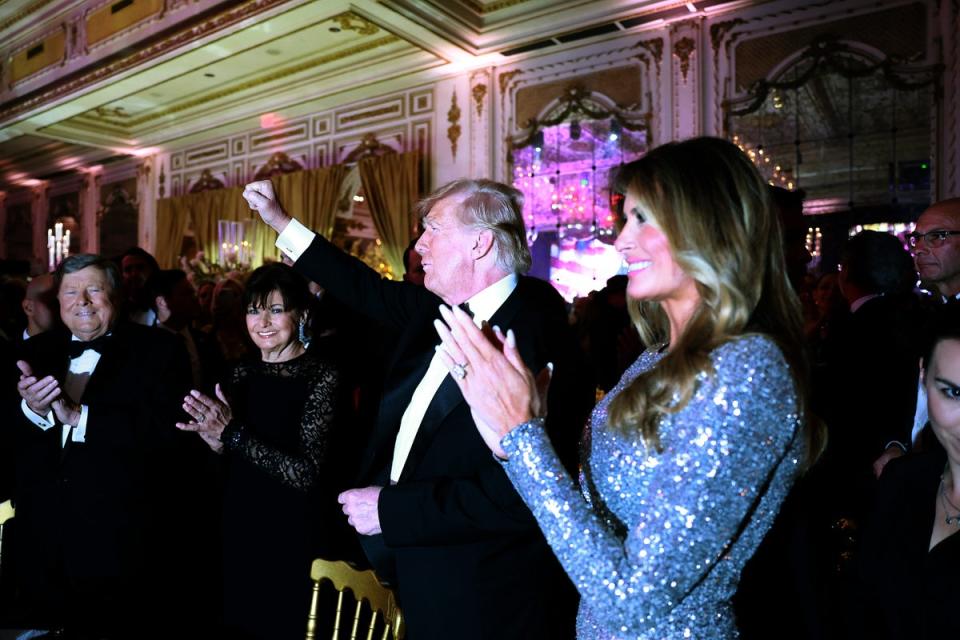 Ms Trump alongside husband former president Donald Trump at the Mar-a-Lago New Year’s Eve party 2022 (Getty Images)