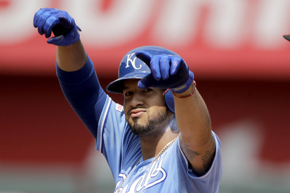 Kansas City Royals' Cheslor Cuthbert celebrates on second after hitting a two-run double during the fifth inning of a baseball game against the Oakland Athletics Thursday, Aug. 29, 2019, in Kansas City, Mo. (AP Photo/Charlie Riedel)
