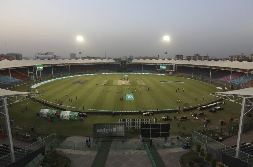 Pakistani cricket teams practice in an empty National Stadium, ahead of their match in the Pakistan Super League in Karachi, Pakistan, Friday, March 13, 2020. The Pakistan Cricket Board decides the Pakistan Super League will go ahead despite the coronavirus outbreak and the withdrawal Friday of 10 foreign players. The vast majority of people recover from the new coronavirus. According to the World Health Organization, most people recover in about two to six weeks, depending on the severity of the illness. (AP Photo/Fareed Khan)