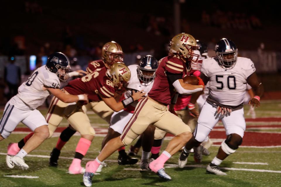 Hartfield Academy carries for yardage against the Jackson Academy Riders at Hartfield on Friday, Oct. 27, 2023, in Flowood, Miss.