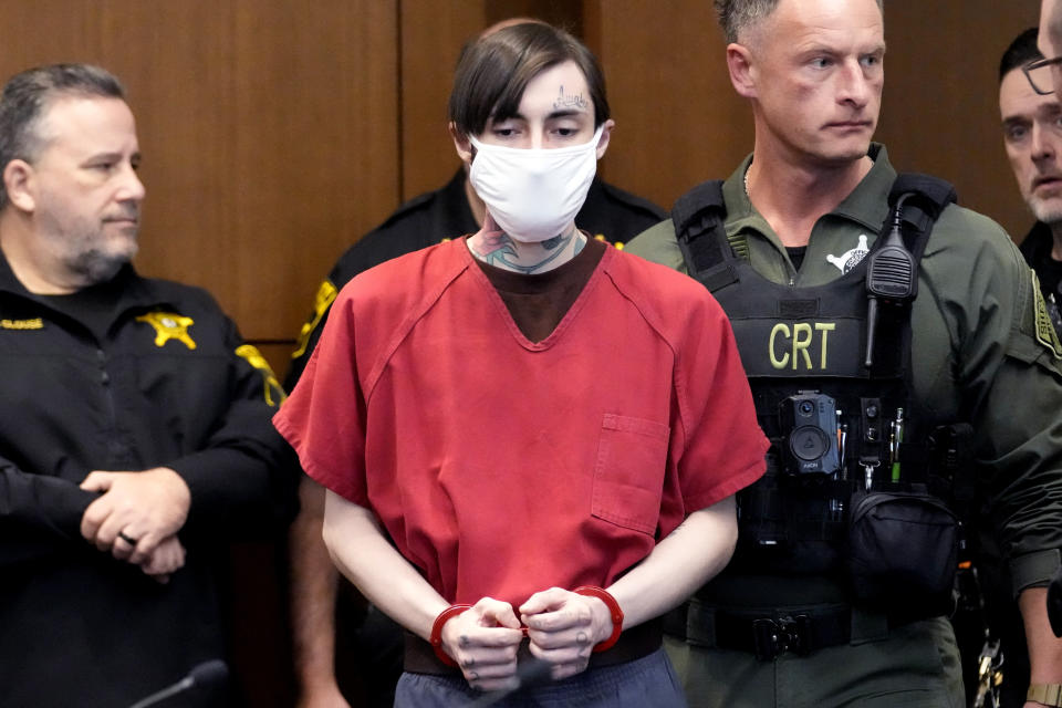 Robert E. Crimo III, is escorted into a courtroom during a case management conference before Judge Victoria A. Rossetti at the Lake County Courthouse Friday, Jan 5, 2024, in Waukegan, Ill. A case management conference is scheduled for a suspect in a mass shooting that left seven people dead during a July 4 parade in Highland Park, Illinois. (AP Photo/Nam Y. Huh, Pool)