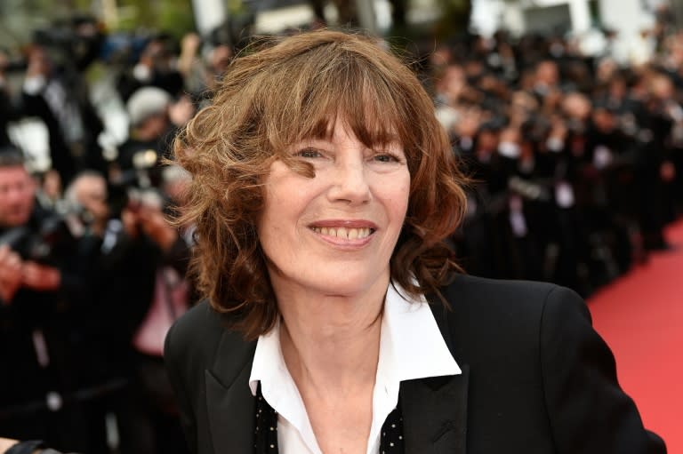 British actress and singer Jane Birkin poses as she arrives for the closing ceremony of the 68th Cannes Film Festival in Cannes, southeastern France, on May 24, 2015